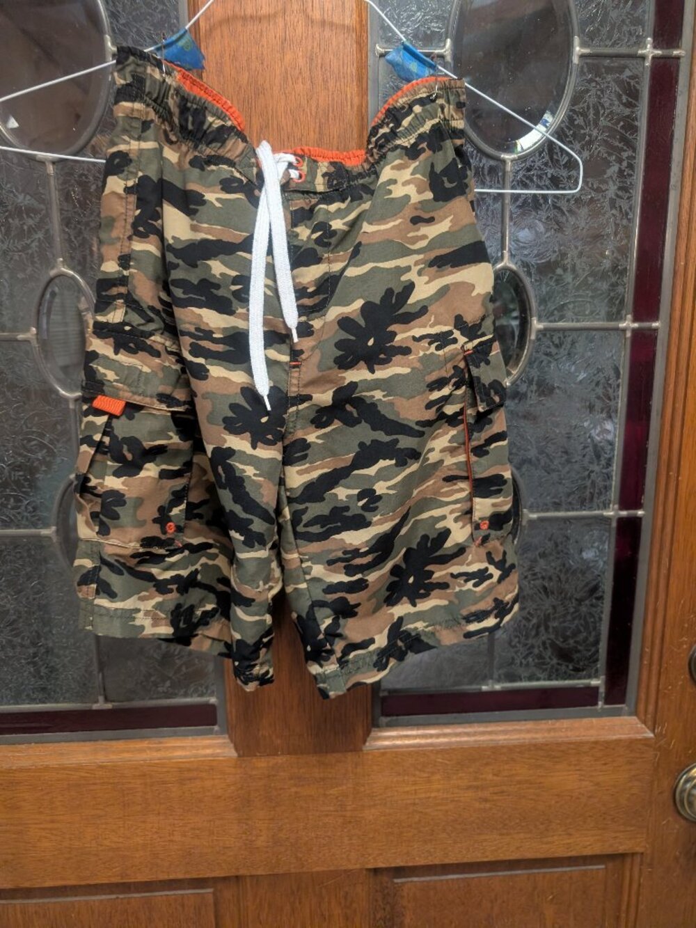 Boys green camouflage swim shorts, size Medium